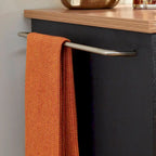 Carrello da cucina in legno nero da 51" con superficie resistente al calore e rotelle bloccabili
