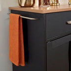 Carrello da cucina in legno nero da 51" con superficie resistente al calore e rotelle bloccabili